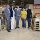 Fünf Personen stehen in einem Billa Markt und lächeln in die Kamera.